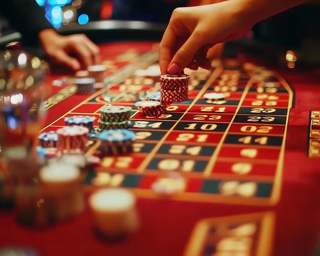 Live-dealer blackjack Live dealer blackjack table with cards and chips